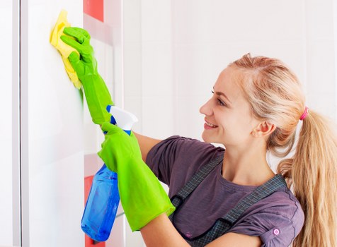 Professional carpet cleaning in a living room with fresh, clean flooring